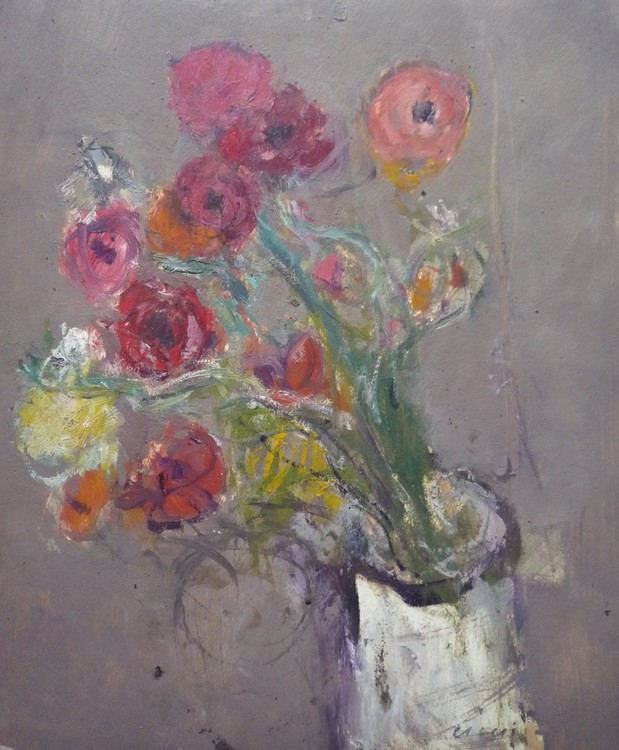 Bouquet de fleurs au vase blanc